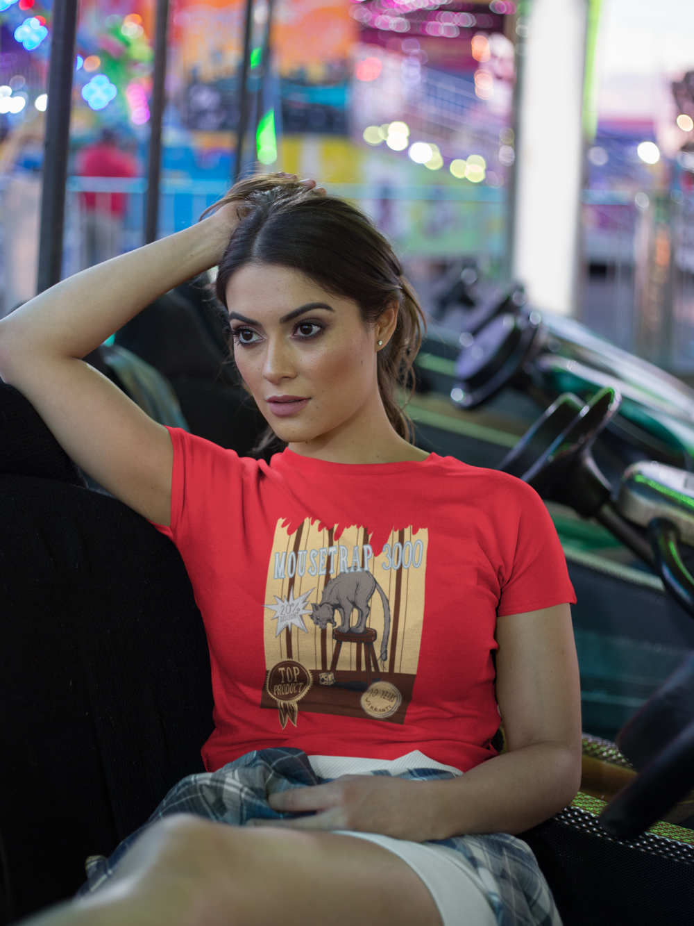 crop top tee mockup being worn by a girl lying on the arcade car games a19440 1