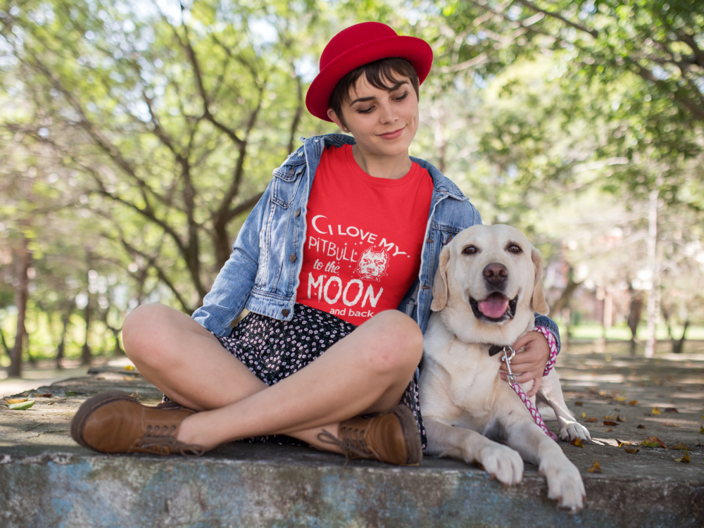 girl at a park with her dog wearing a tshirt mockup a17983