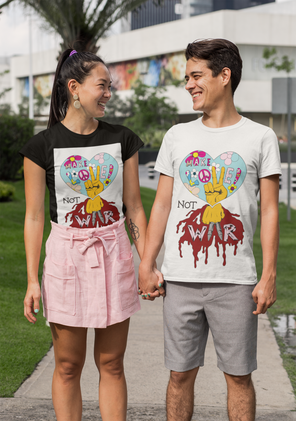 mockup of a young couple with customizable t shirts holding hands 29769 1