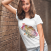 mockup of a young woman wearing a customizable t shirt and leaning against a brick wall 2764 el1 1