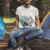 t shirt and dad hat mockup of a man at a camping site with his dog 30475