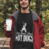 t shirt mockup featuring a man holding a 20 oz travel mug in the woods 30486