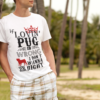 t shirt mockup featuring a man leaning on a palm tree 2753 el1