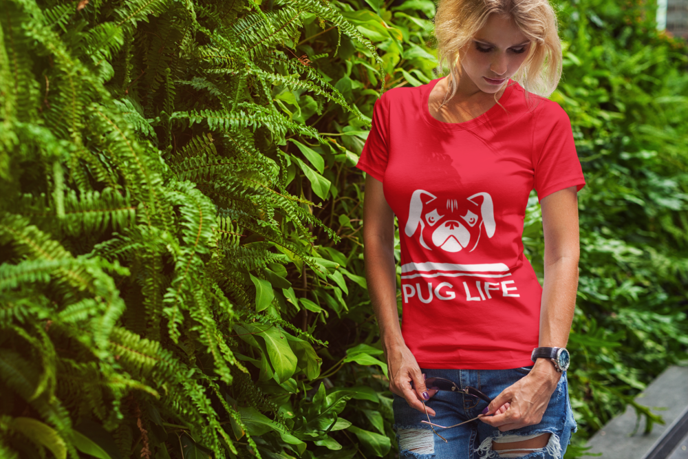 t shirt mockup of a blonde woman posing by a vertical garden 2231 el1
