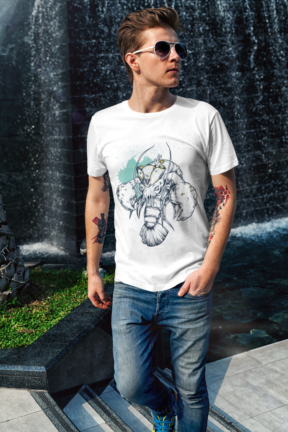t shirt mockup of a cool man walking by a fountain 2190 el1