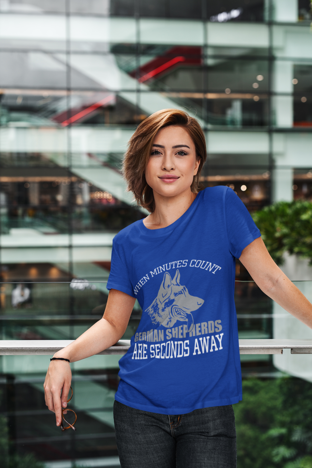 t shirt mockup of a cool woman in a modern building 414 el