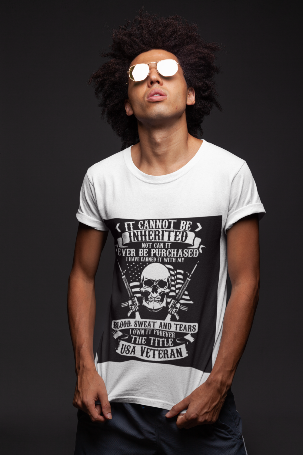 t shirt mockup of a man with dark glasses under a bright light 22859 1