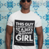 t shirt mockup of a man with sunglasses against a blue tiling 30449 1