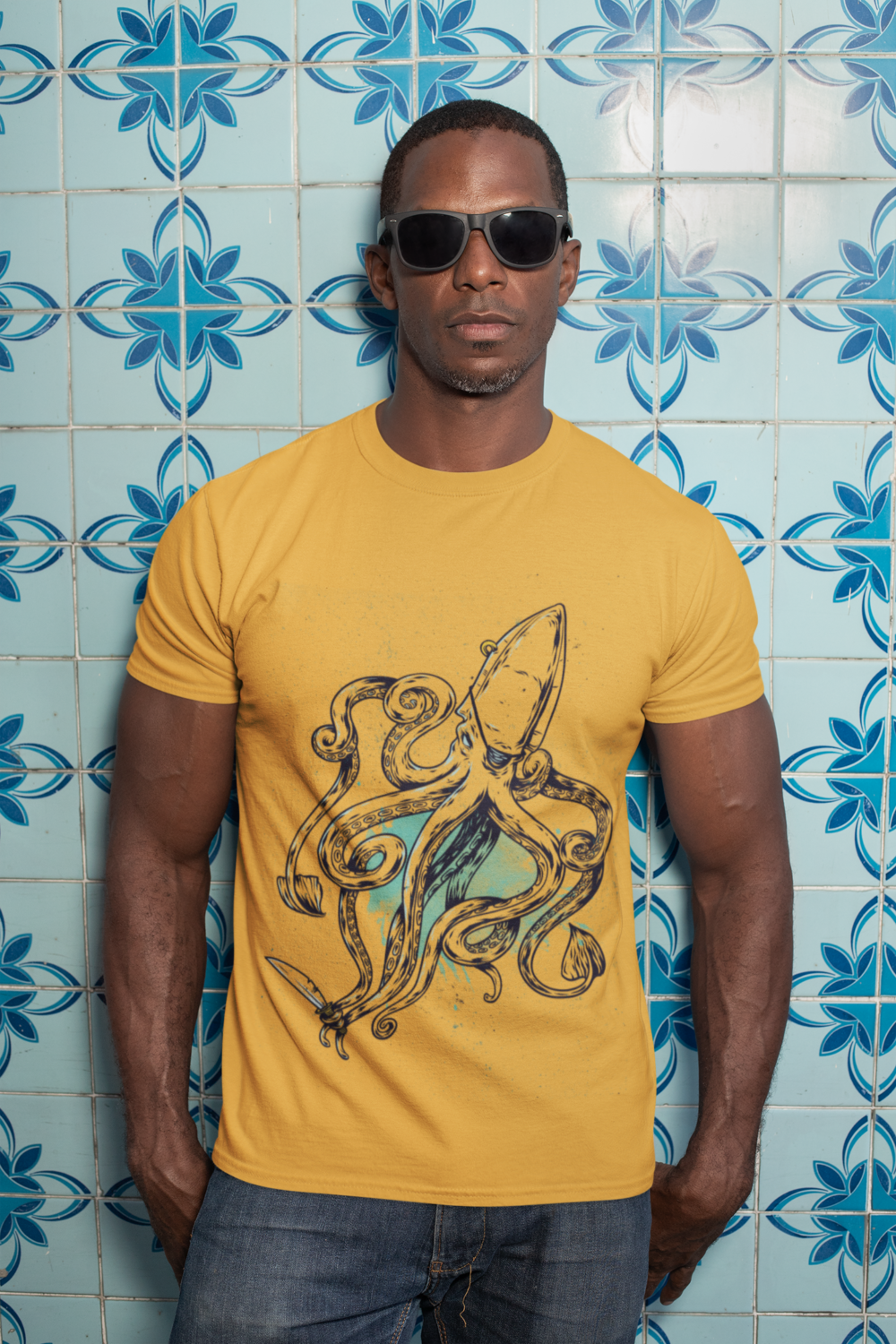 t shirt mockup of a man with sunglasses against a blue tiling 30449