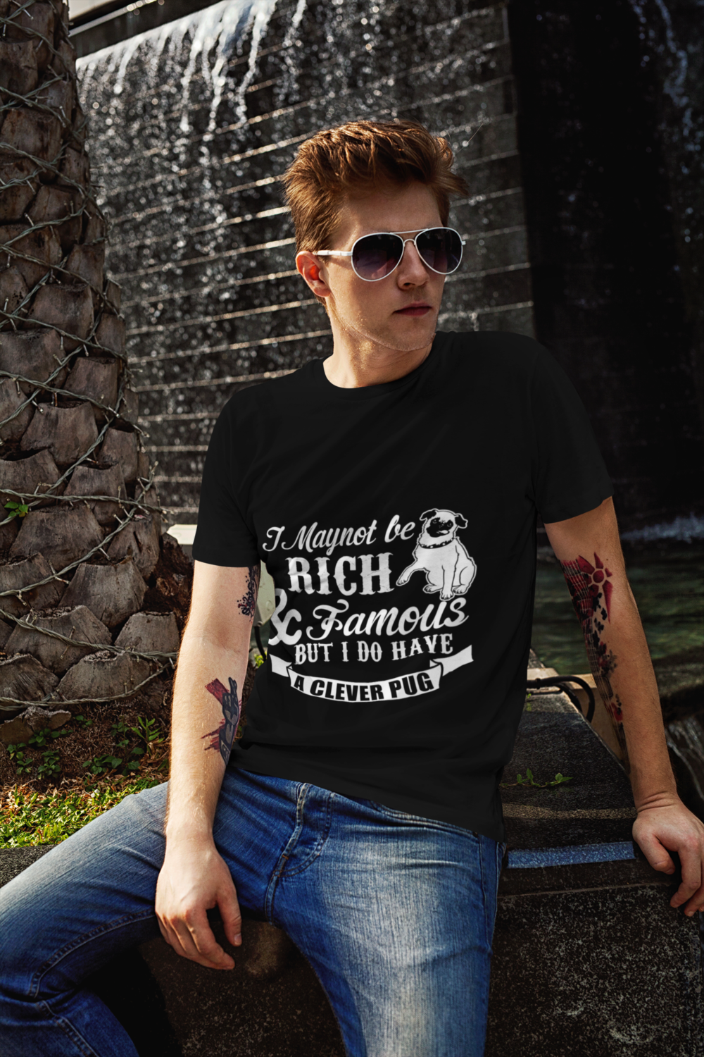 t shirt mockup of a red haired man posing next to a fountain 2191 el1 4