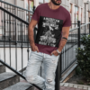 t shirt mockup of a serious looking man standing on concrete steps 1023 el 1