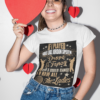 t shirt mockup of a smiling woman holding a paper heart 31241