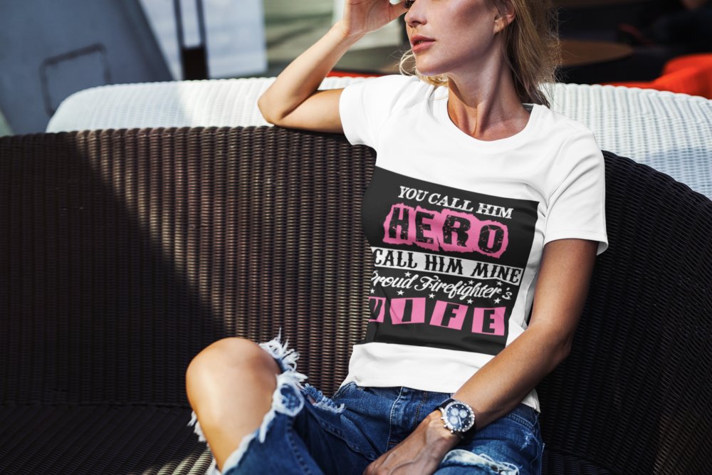 t shirt mockup of a stylish woman sitting in the sunlight 2229 el1