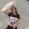 t shirt mockup of a trendy woman with sunglasses leaning over a concrete structure 27340