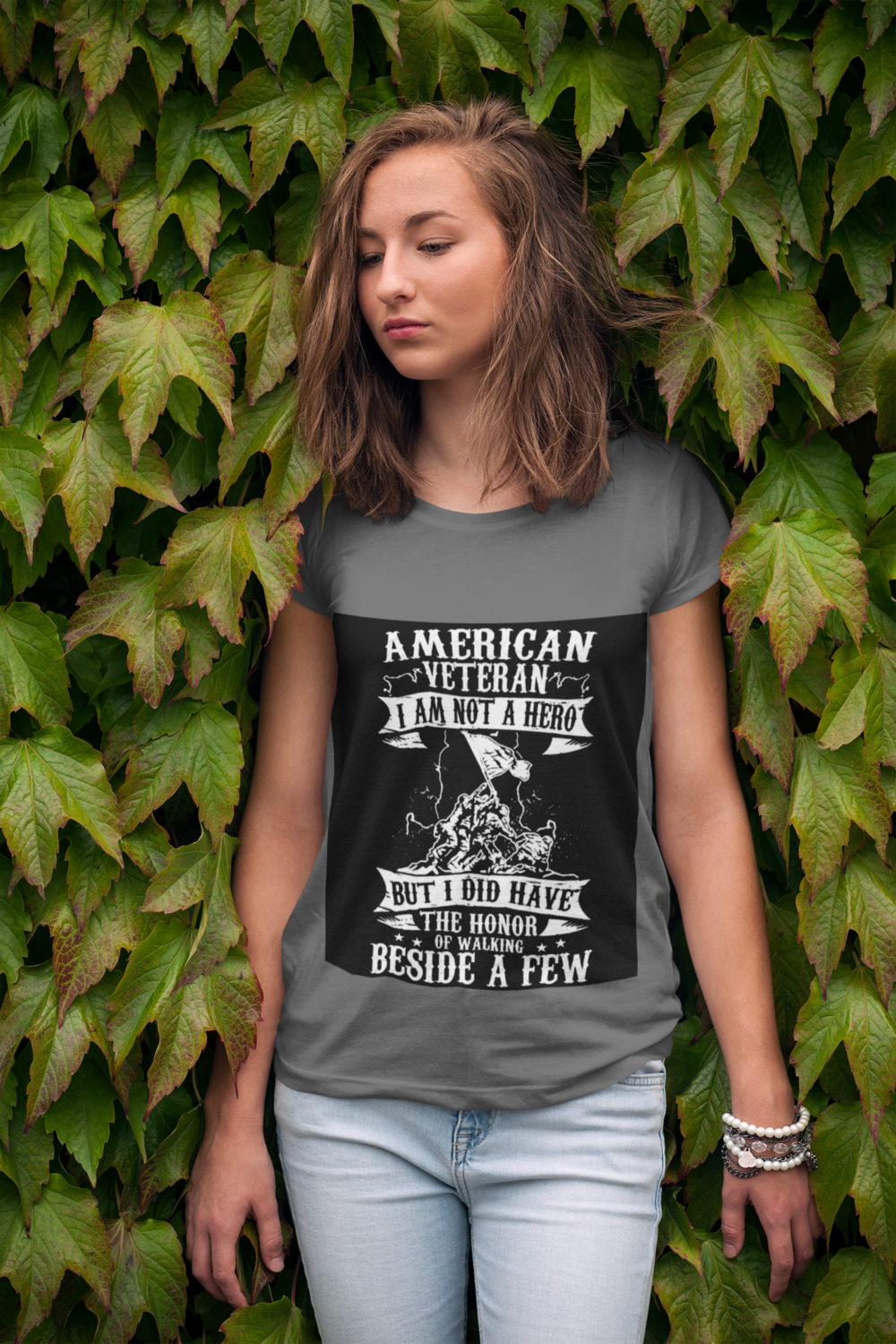 t shirt mockup of a young woman leaning on a wall of ivy 2761 el1 1
