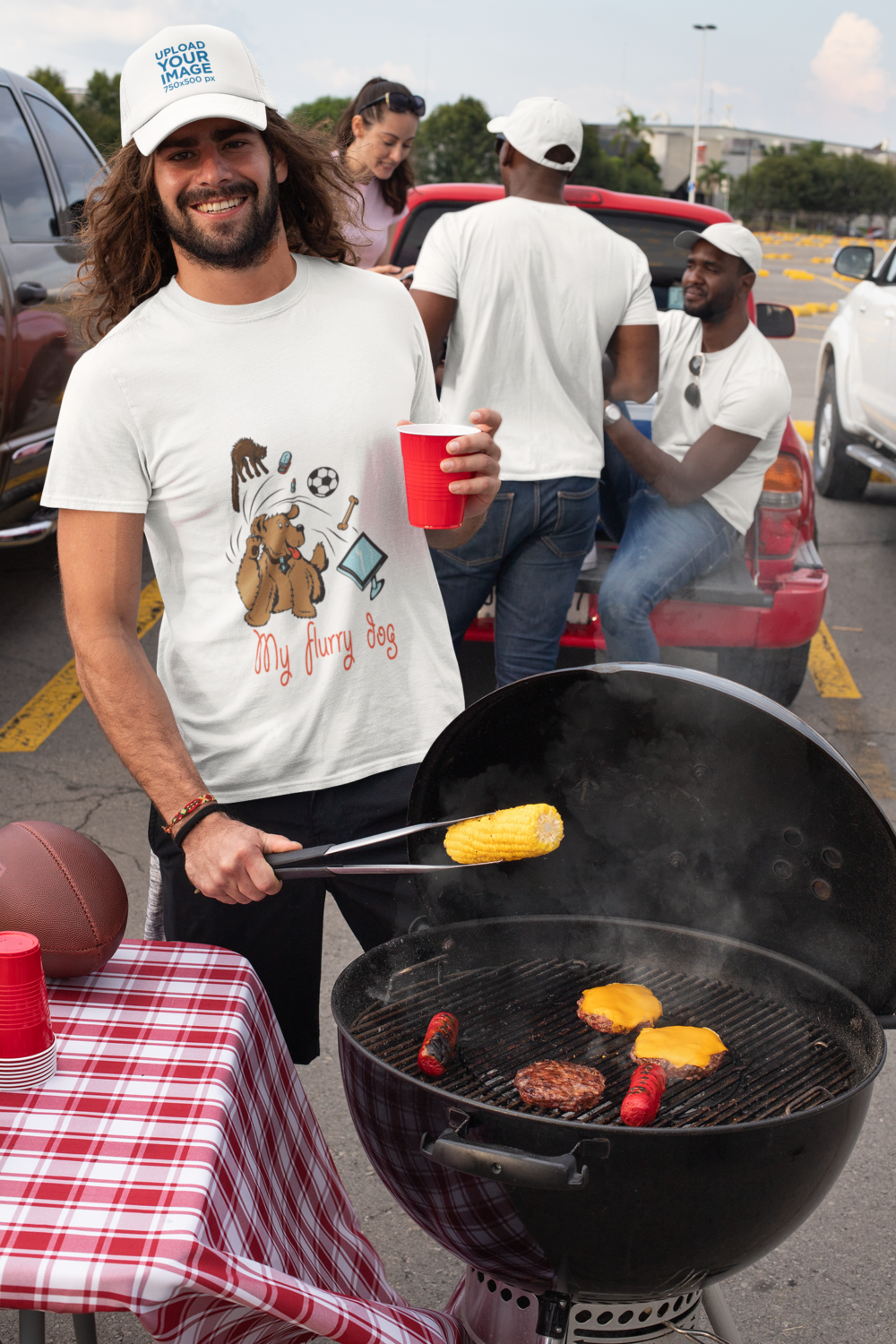 trucker hat mockup of a smiling man wearing a t shirt at a tailgate party 29894