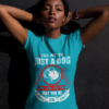 young black girl looking to the camera while wearing a tshirt mockup a16070